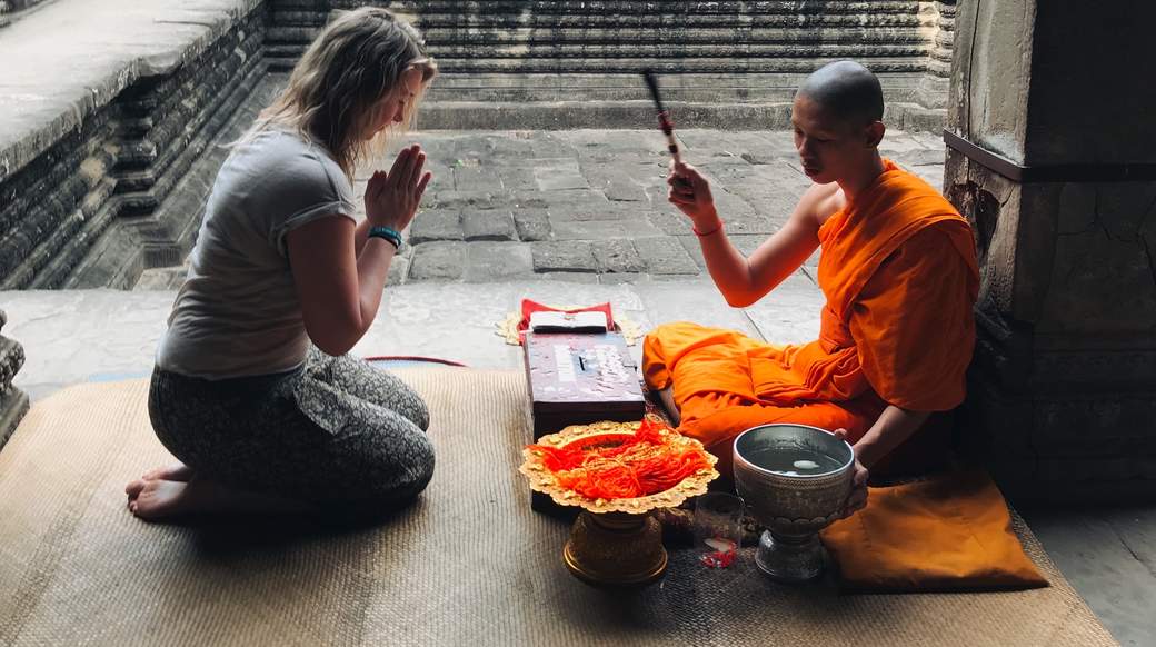 monk blessing angkor wat experience