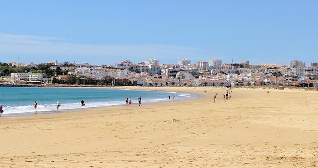 Beach Lagos A big beach with the town of Lagos in the background