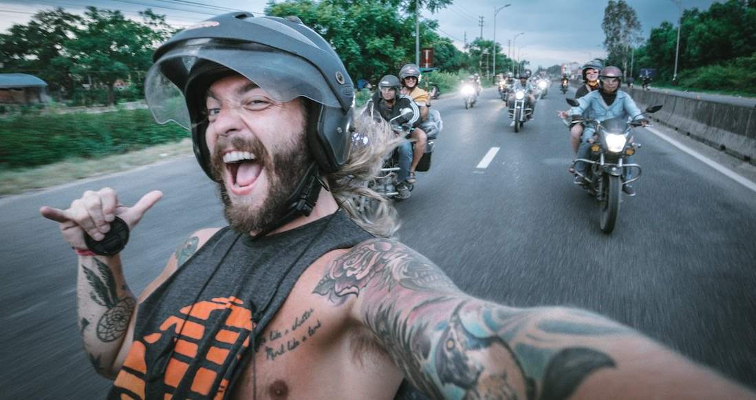 Easy Riders Tour stoked traveler on a motorcycle tour