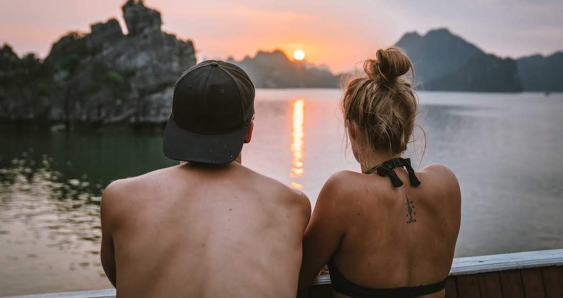 Halong Bay sunset travelers watching sunset in halong bay