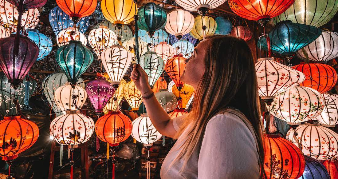 Vietnamese Lanterns traveler looking at Vietnamese lanterns