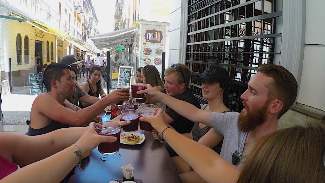 Sangria Spain A group of people toasting cups of sangria