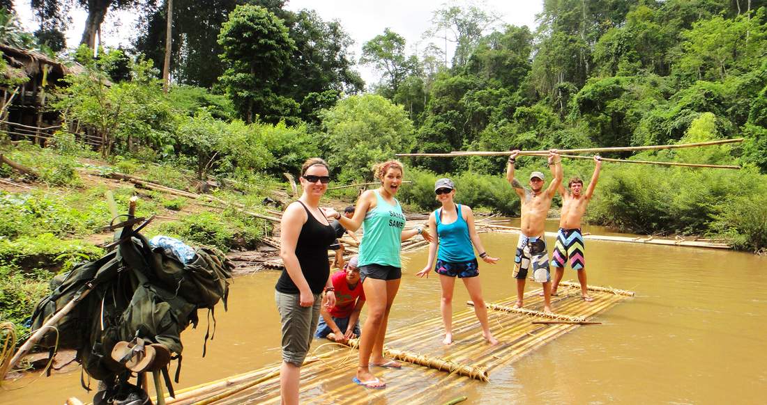 Bamboo Rafting bamboo rafting down a river in Northern Thailand