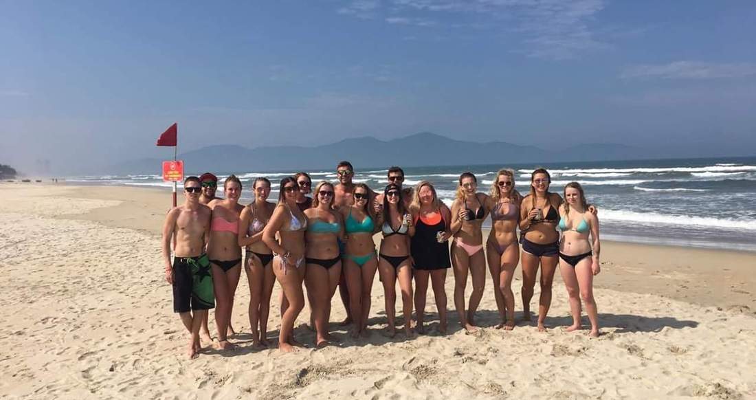 Travelers on beach A group of happy travelers on a beach in Vietnam