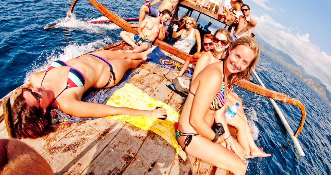 Gili boat group shot of travelers on a boat in the Gili Islands, Indonesia