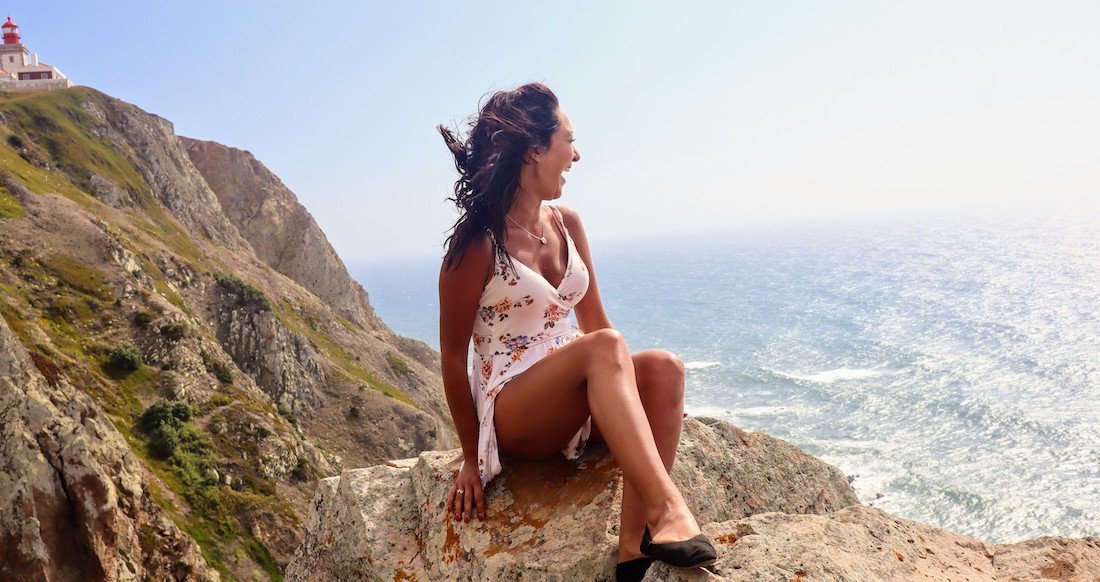 Cabo da Roca Viewpoint traveler sitting on the edge of europe