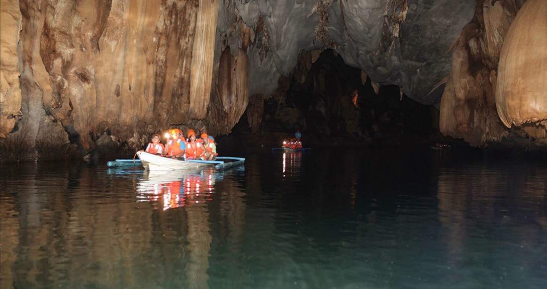 Puerto Princesa Philippines Travelers exploring the Puerto Princesa caves in the Philippines
