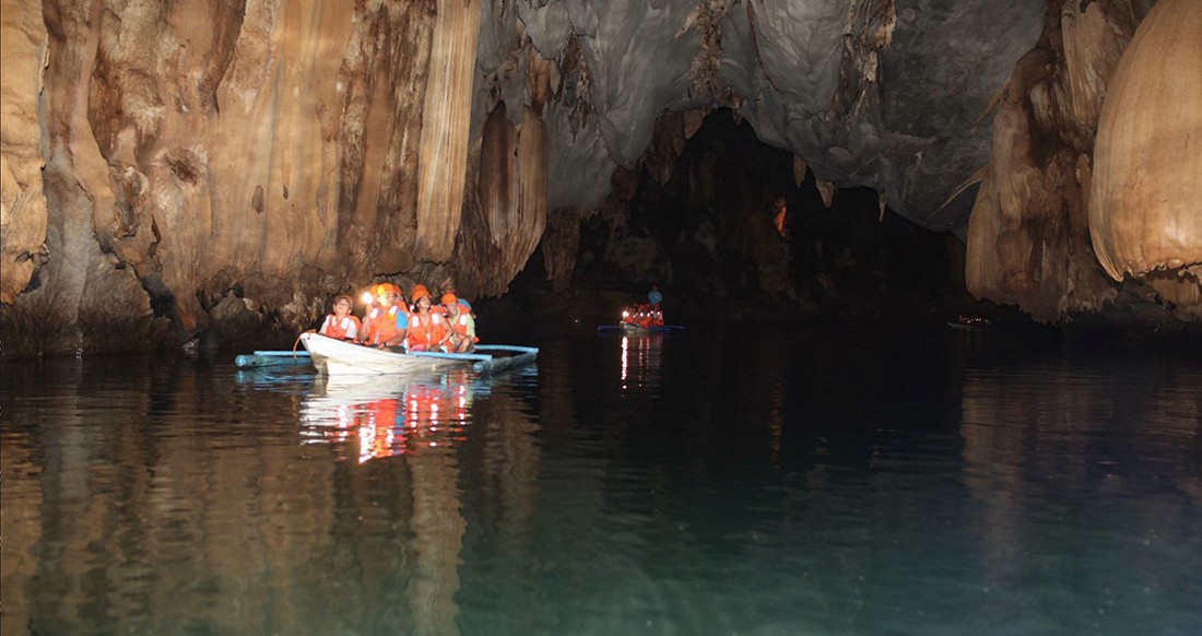 Puerto Princesa Philippines Travelers exploring the Puerto Princesa caves in the Philippines