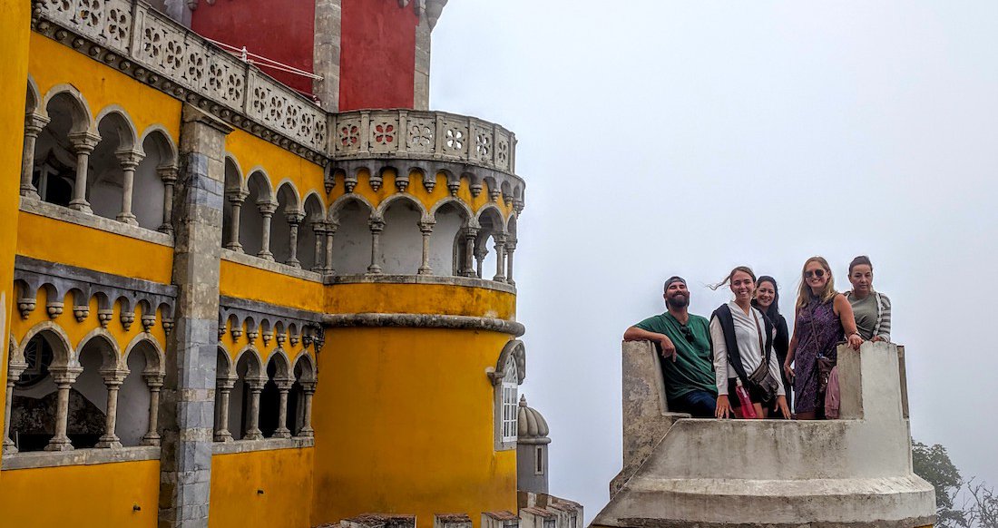 Pena Palace, Sintra A group of travelers pose at pena palace