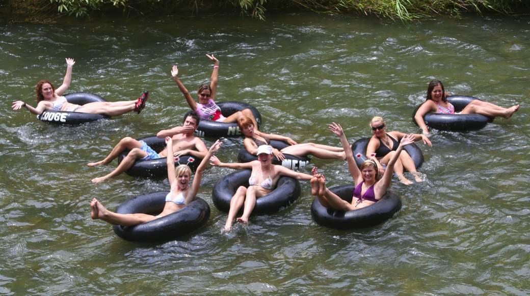 Tubing Group of girls floating down the river in Khao Sok Thailand