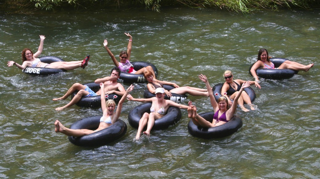 Tubing Group of girls floating down the river in Khao Sok Thailand