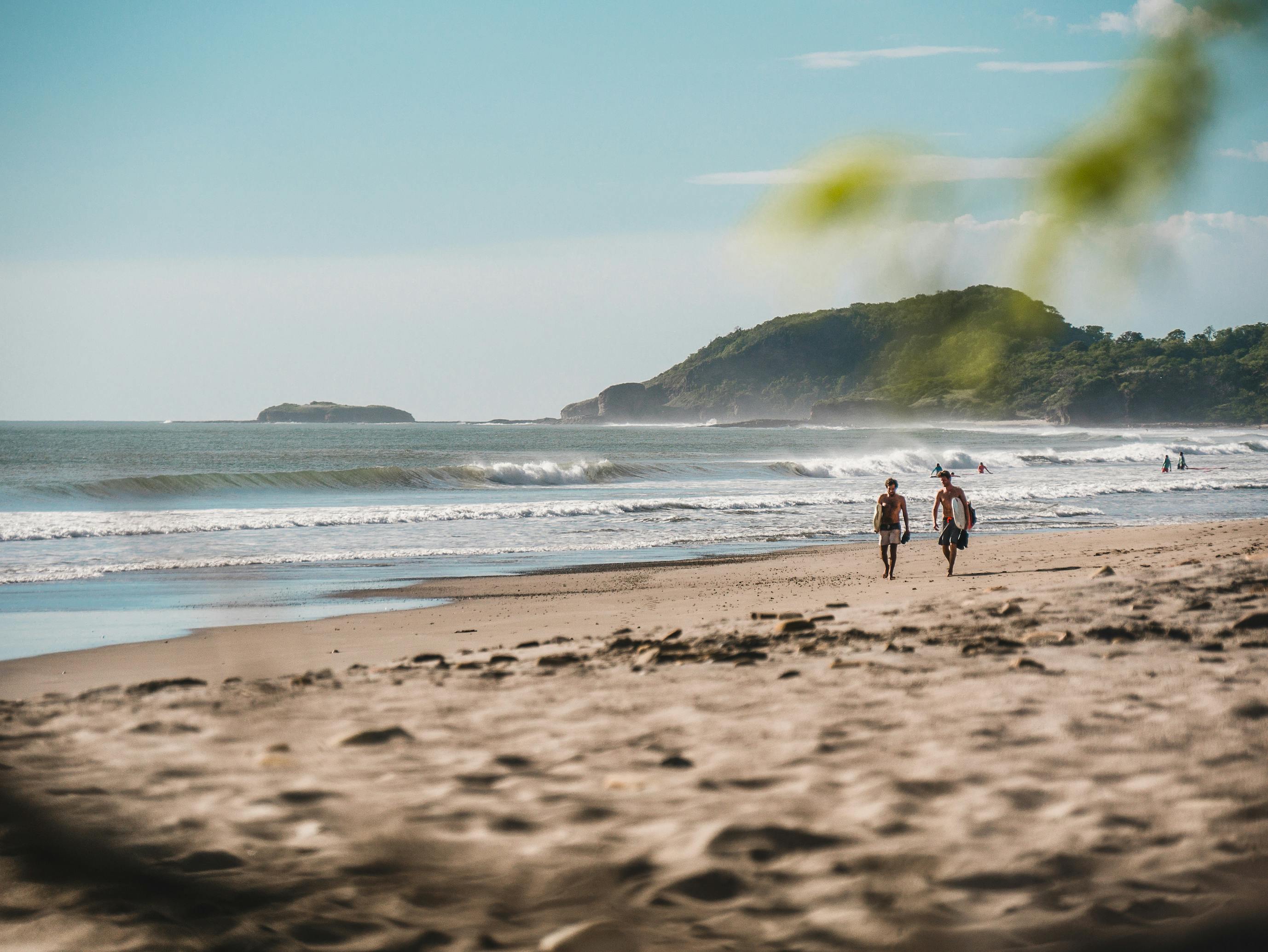 Surfers on the beach, San Juan del Sur, Nicaragua