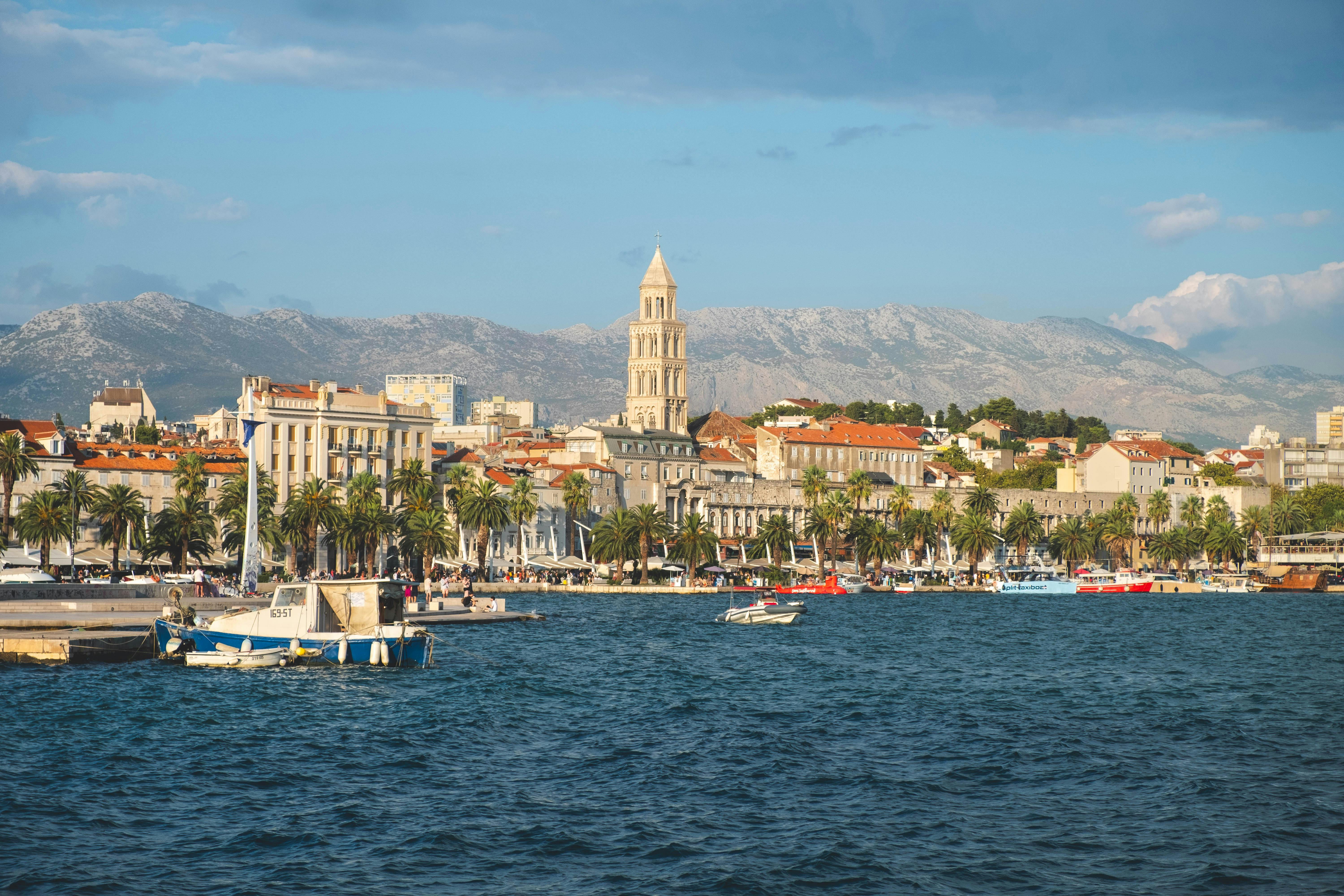 Split waterfront promenade and Diocletian's Palace cathedral tower at golden hour